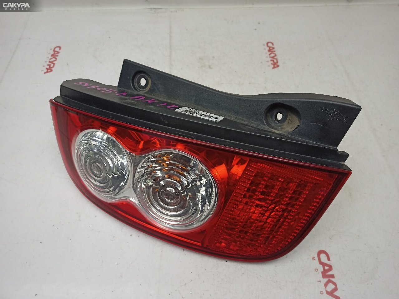 Фонарь стоп-сигнала левый Nissan March AK12 CR12DE D019: купить в Сакура Красноярск.