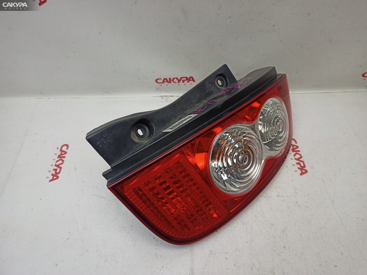 Фонарь стоп-сигнала правый Nissan March AK12 CR12DE D019: купить в Сакура Красноярск.