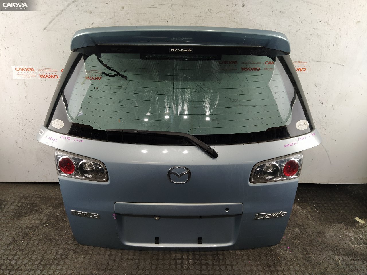 Дверь багажника Mazda Demio DY3W ZJ-VE: купить в Сакура Красноярск.