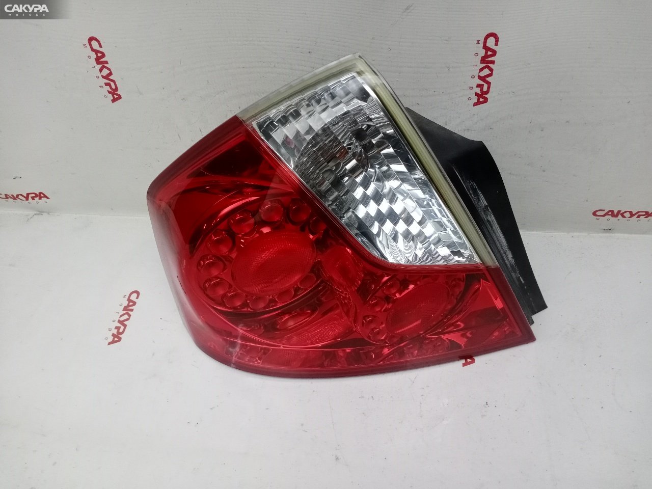Фонарь стоп-сигнала левый Nissan Fuga Y50 VQ25DE 220-63786: купить в Сакура Красноярск.
