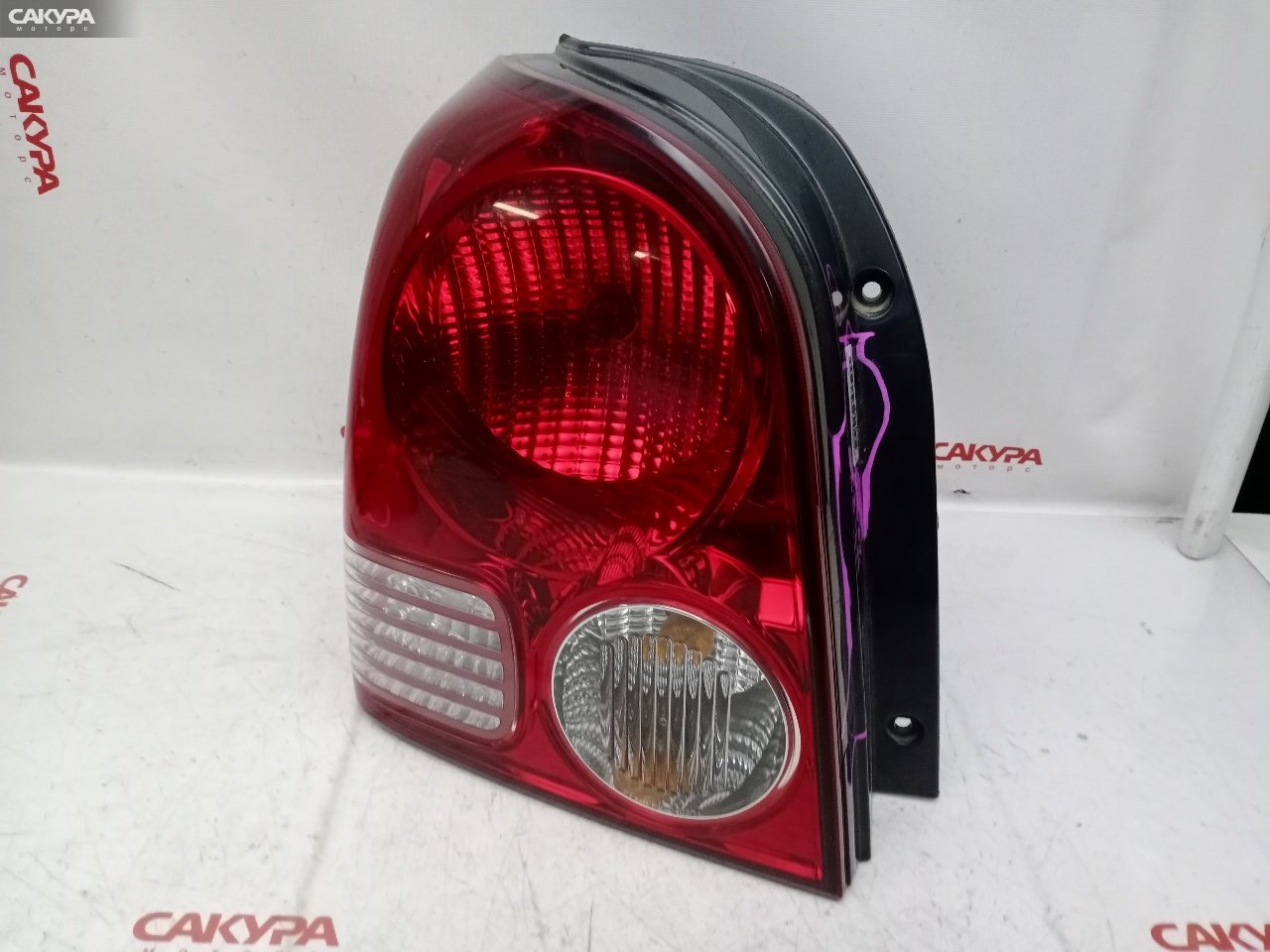 Фонарь стоп-сигнала левый Mitsubishi Dion CR9W 4G63 P1063: купить в Сакура Красноярск.