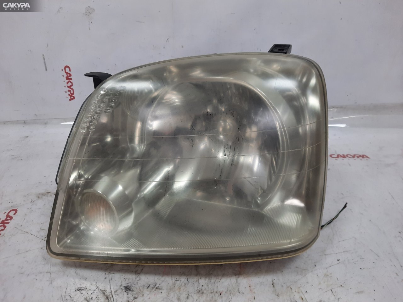 Фара левая Mitsubishi Dion CR9W 4G63 100-87473: купить в Сакура Красноярск.