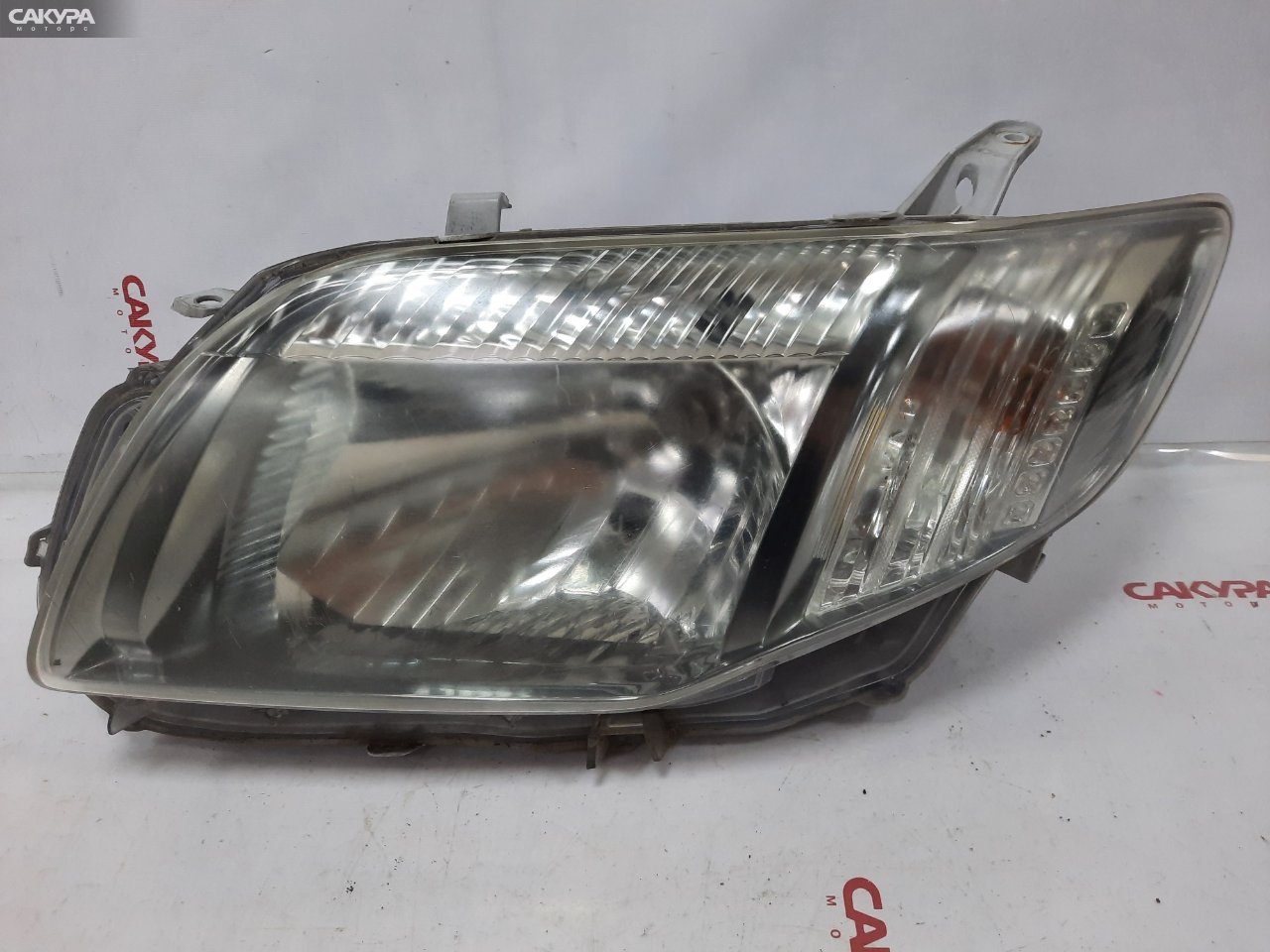 Фара левая Toyota Corolla Fielder NZE144G 1NZ-FE 13-98: купить в Сакура Красноярск.