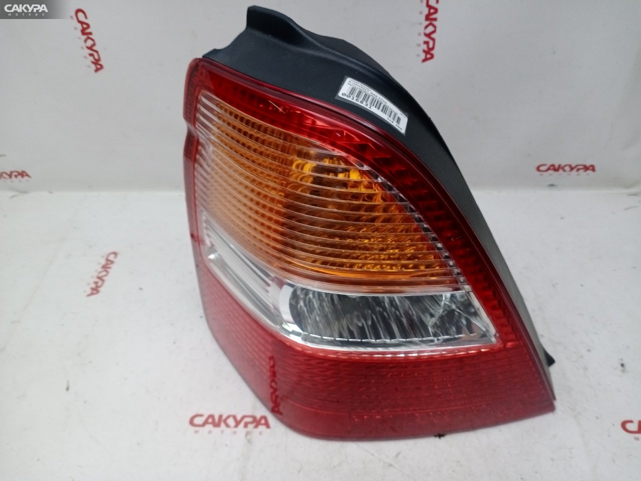 Фонарь стоп-сигнала левый Honda Odyssey RA6 F23A P0711: купить в Сакура Красноярск.