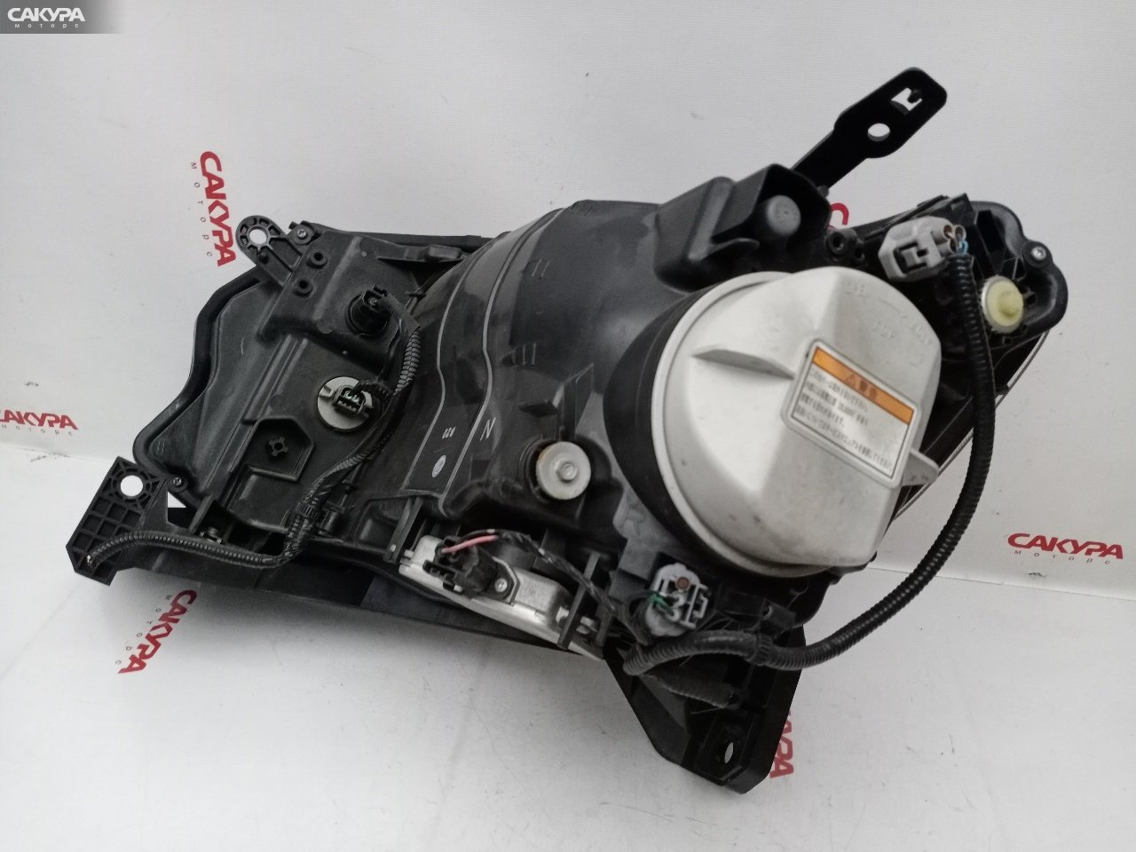 Фара правая Honda Freed Spike GB3 L15A 100-22068: купить в Сакура Красноярск.