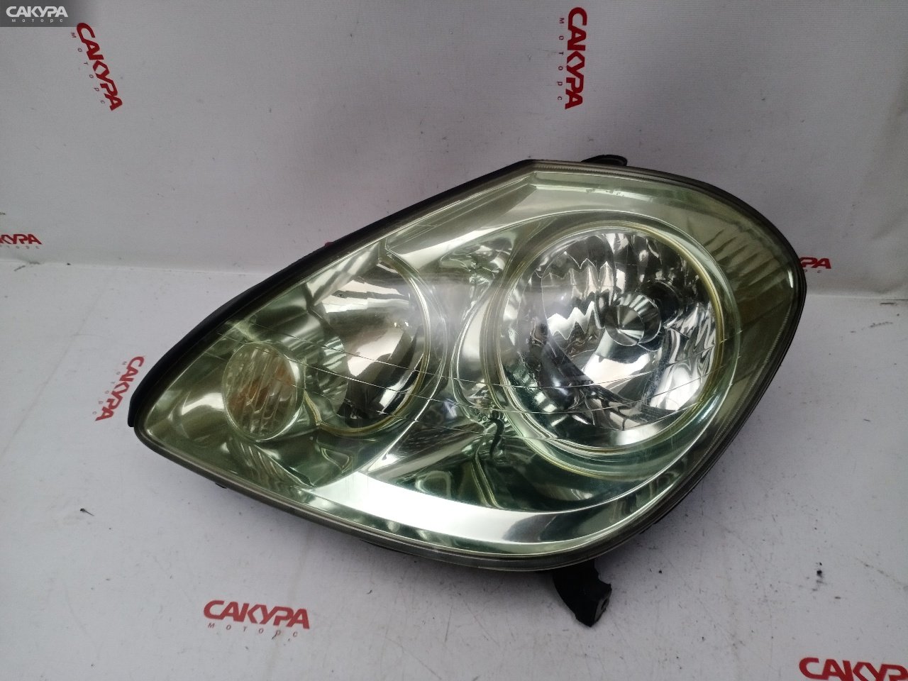Фара левая Toyota Brevis JCG11 2JZ-FSE 51-16: купить в Сакура Красноярск.