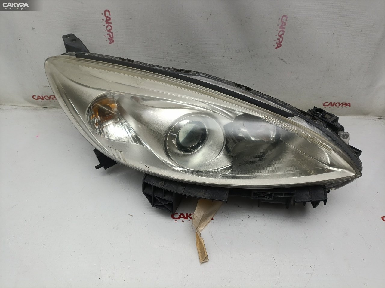Фара правая Mazda Premacy CWEAW LF-VE P9566: купить в Сакура Красноярск.