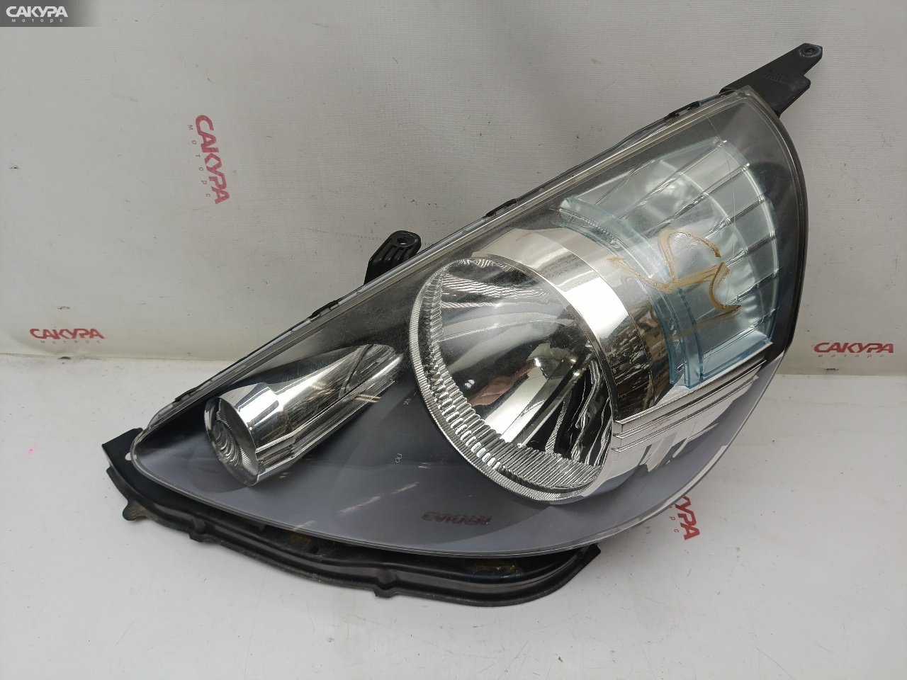 Фара левая Honda FIT GD1 L13A P4944: купить в Сакура Красноярск.