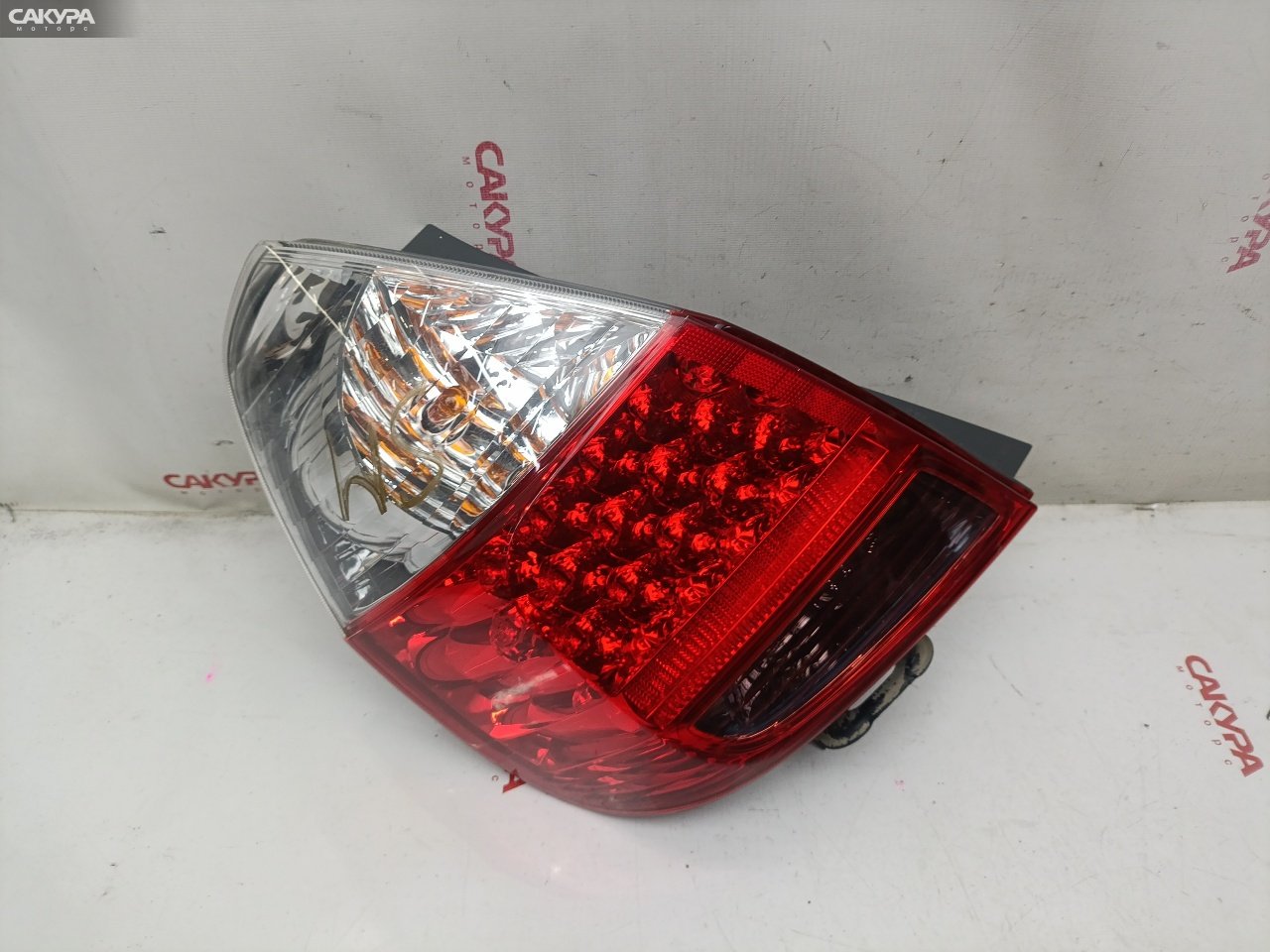 Фонарь стоп-сигнала левый Honda FIT GD1 L13A 4995: купить в Сакура Красноярск.