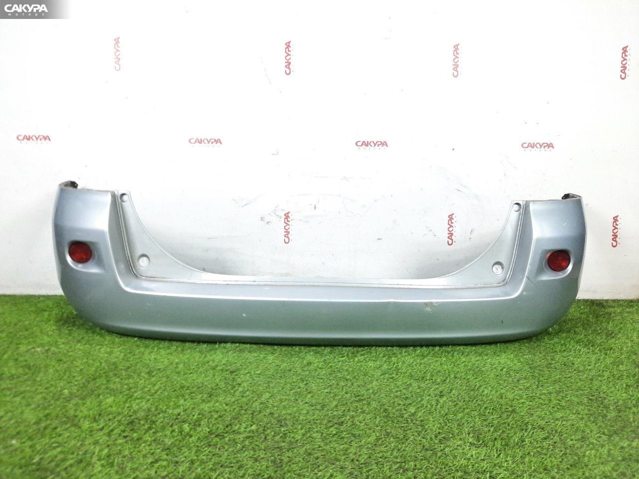 Бампер задний Mazda Demio DY3W ZJ-VE U1A4: купить в Сакура Красноярск.