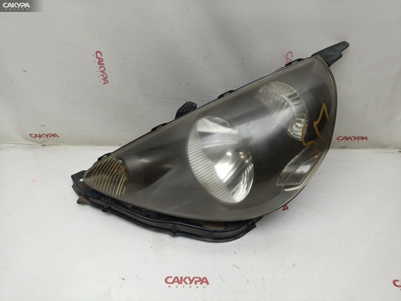 Фара левая Honda FIT GD1 L13A P1680: купить в Сакура Красноярск.