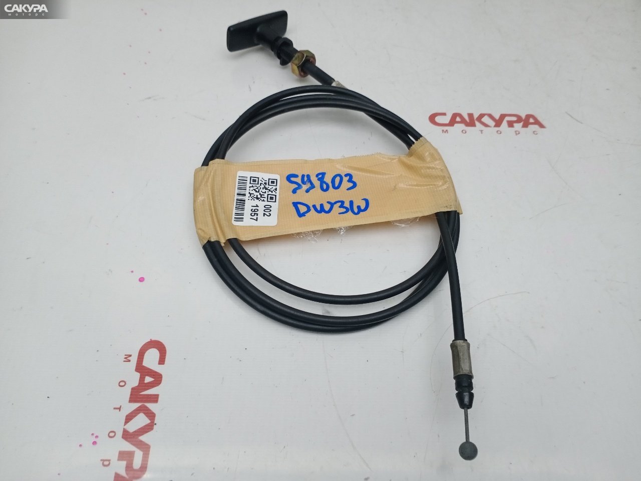 Трос капота Mazda Demio DW3W B3E: купить в Сакура Красноярск.