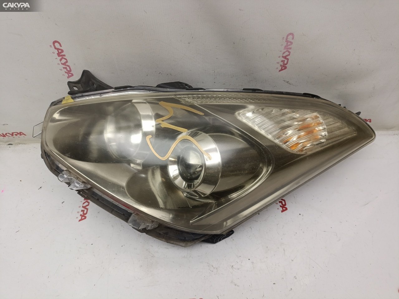 Фара левая Toyota Wish ANE11W 1AZ-FSE 68-13: купить в Сакура Красноярск.