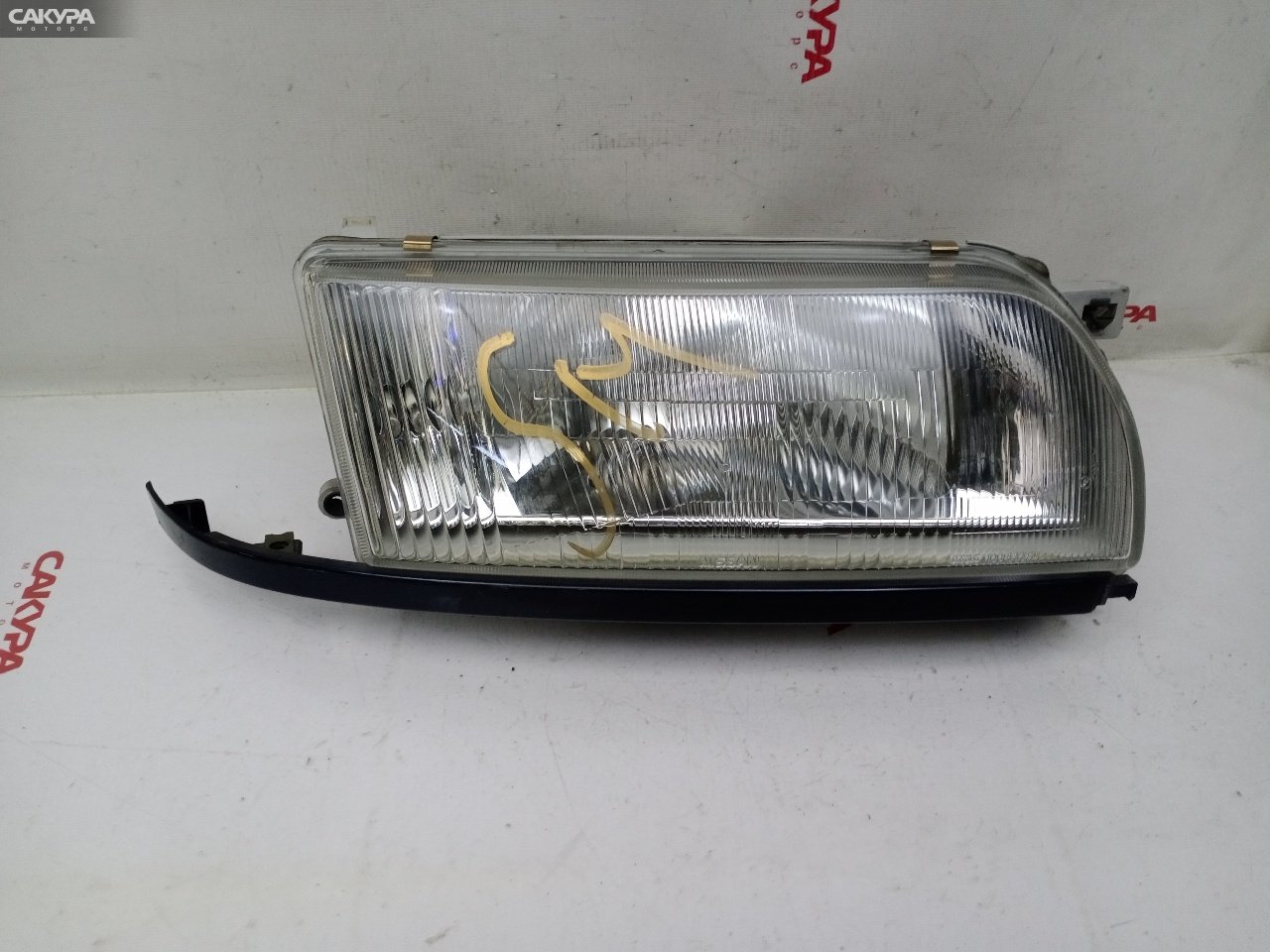 Фара правая Nissan Primera P10 SR18DI 100-63317: купить в Сакура Красноярск.