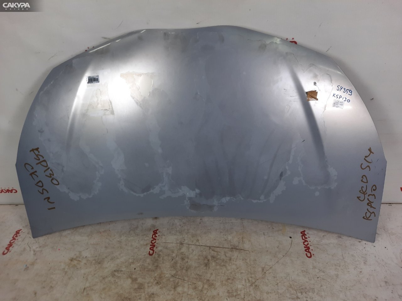 Капот Toyota Vitz KSP130 1KR-FE: купить в Сакура Красноярск.