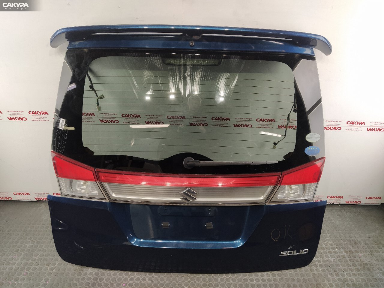 Дверь багажника Suzuki Solio MA15S K12B: купить в Сакура Красноярск.