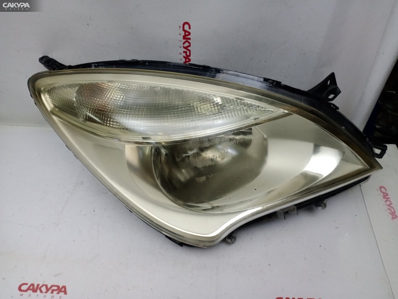 Фара правая Suzuki Solio MA15S K12B 35100-54M0: купить в Сакура Красноярск.