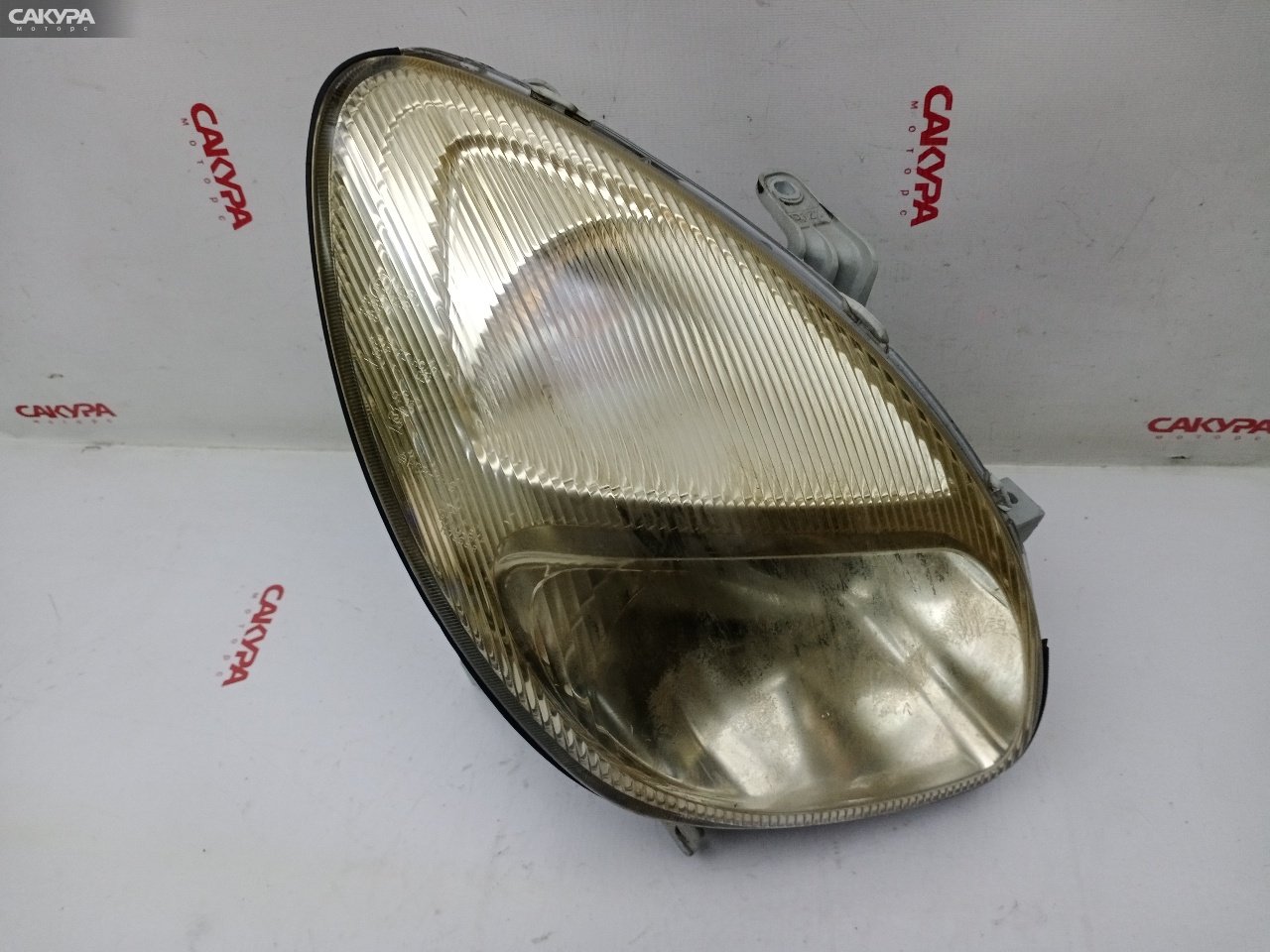 Фара правая Toyota Duet M111A K3-VE2 R7368: купить в Сакура Красноярск.