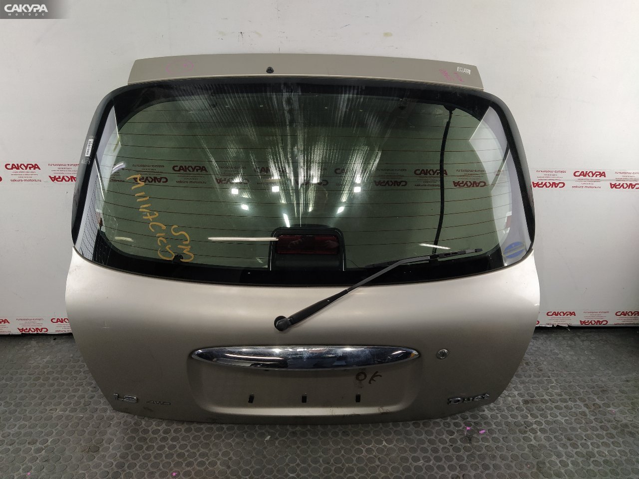 Дверь багажника Toyota Duet M111A K3-VE2: купить в Сакура Красноярск.