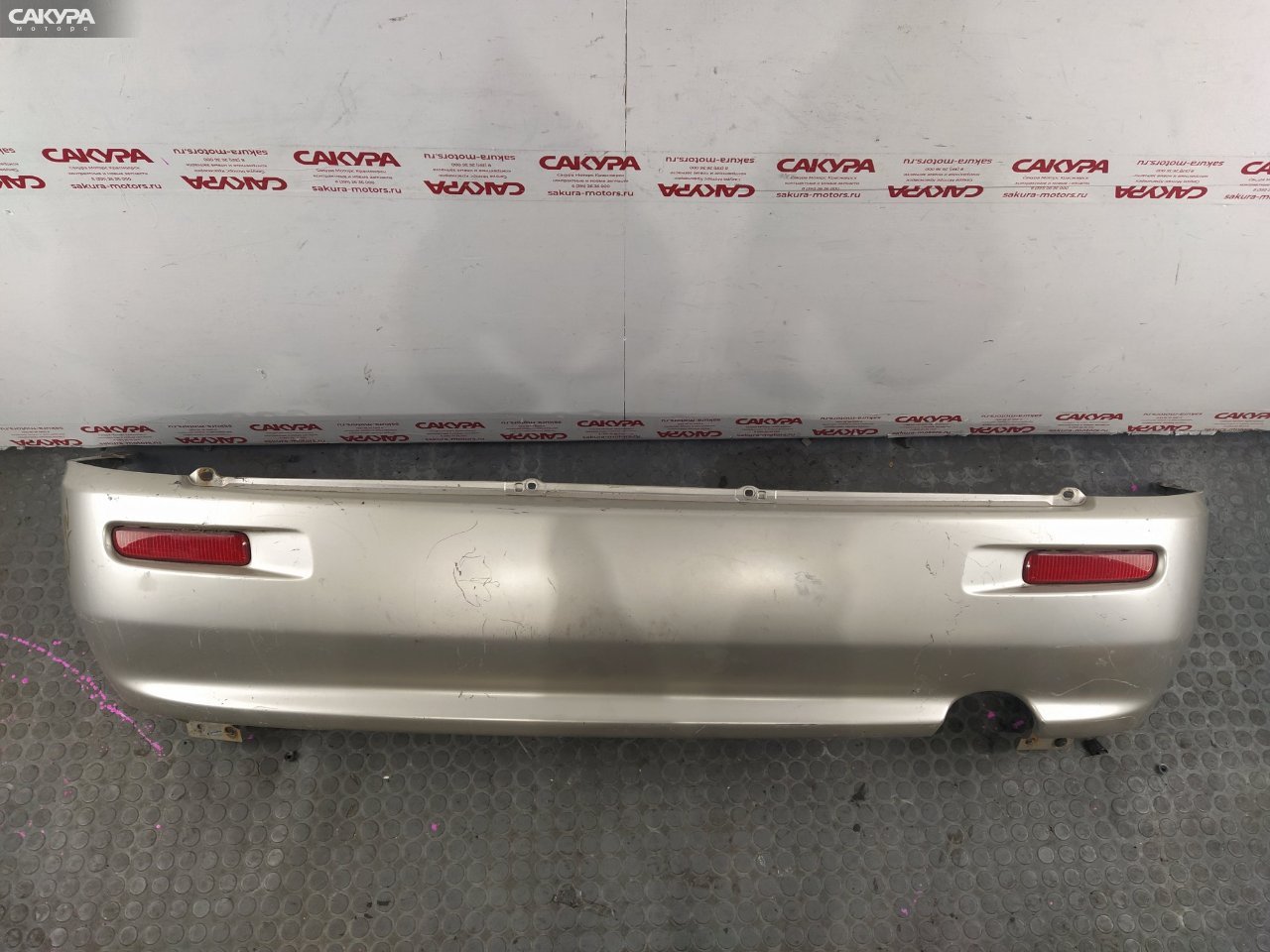 Бампер задний Toyota Duet M111A K3-VE2: купить в Сакура Красноярск.