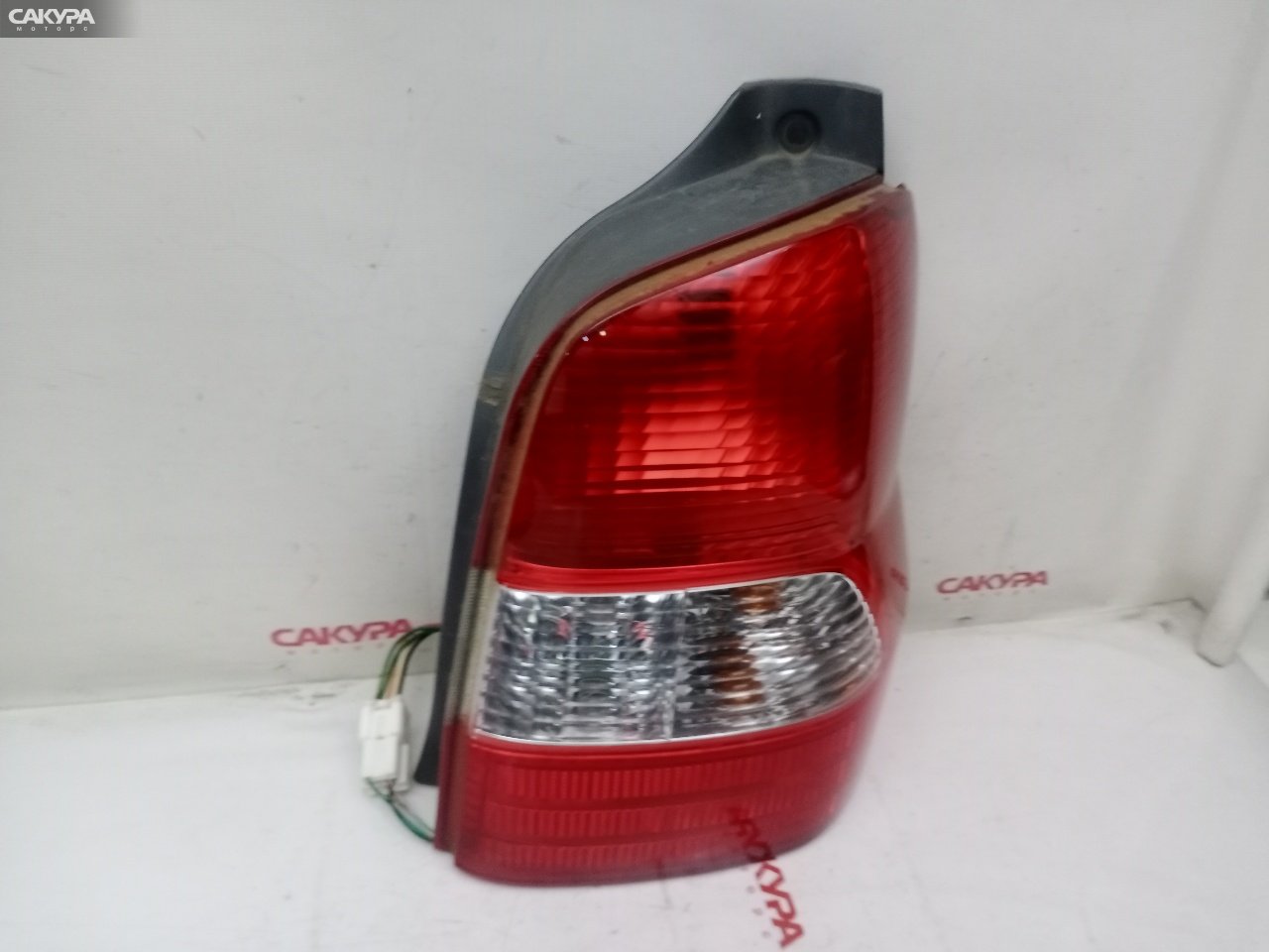 Фонарь стоп-сигнала правый Mazda Demio DW3W B3E 4902: купить в Сакура Красноярск.