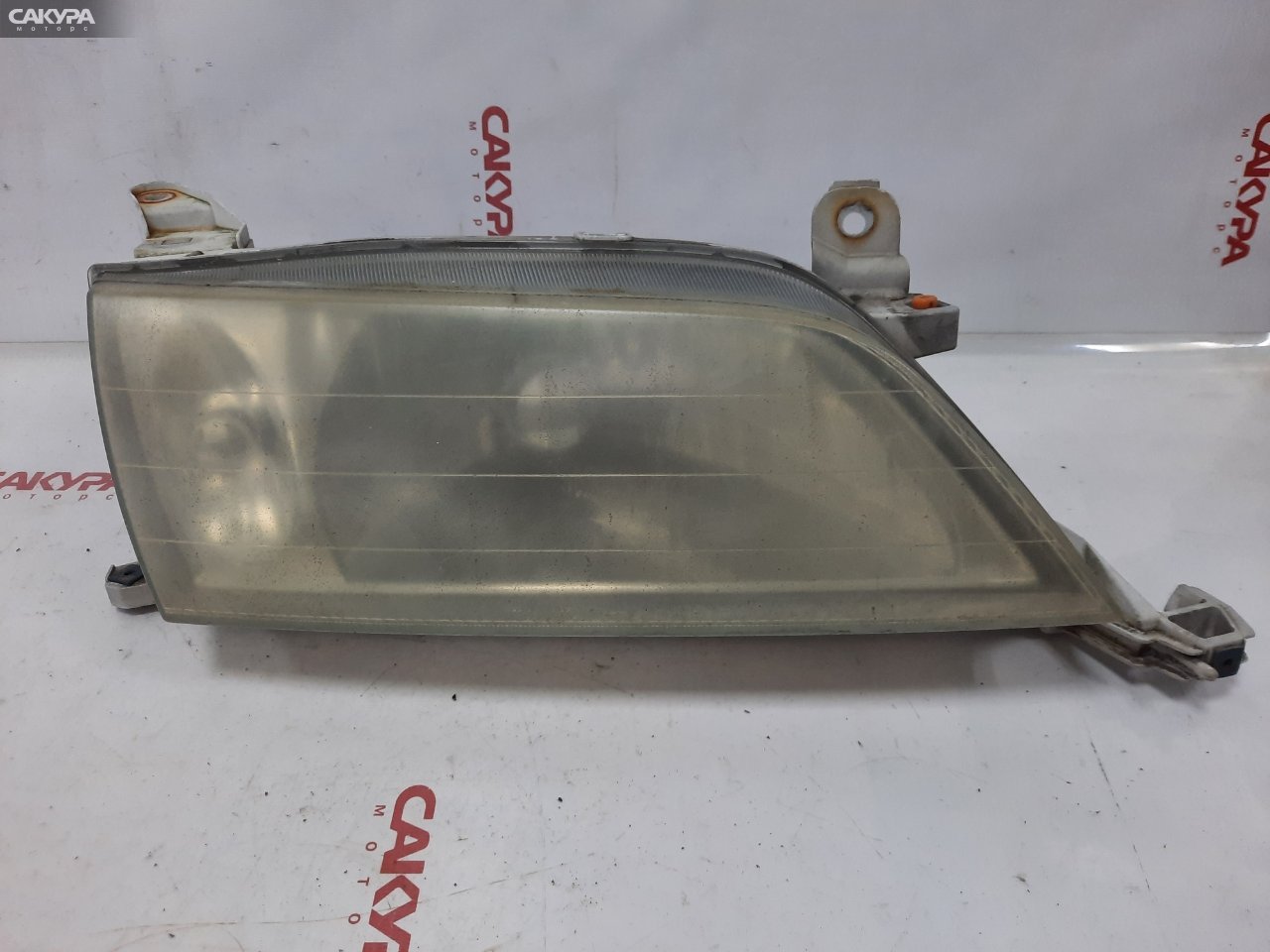 Фара правая Toyota Carina AT212 5A-FE 20-402: купить в Сакура Красноярск.