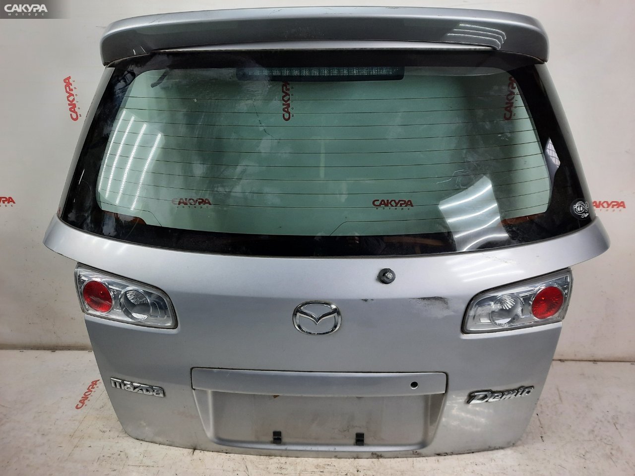 Дверь багажника Mazda Demio DY3W ZJ-VE: купить в Сакура Красноярск.