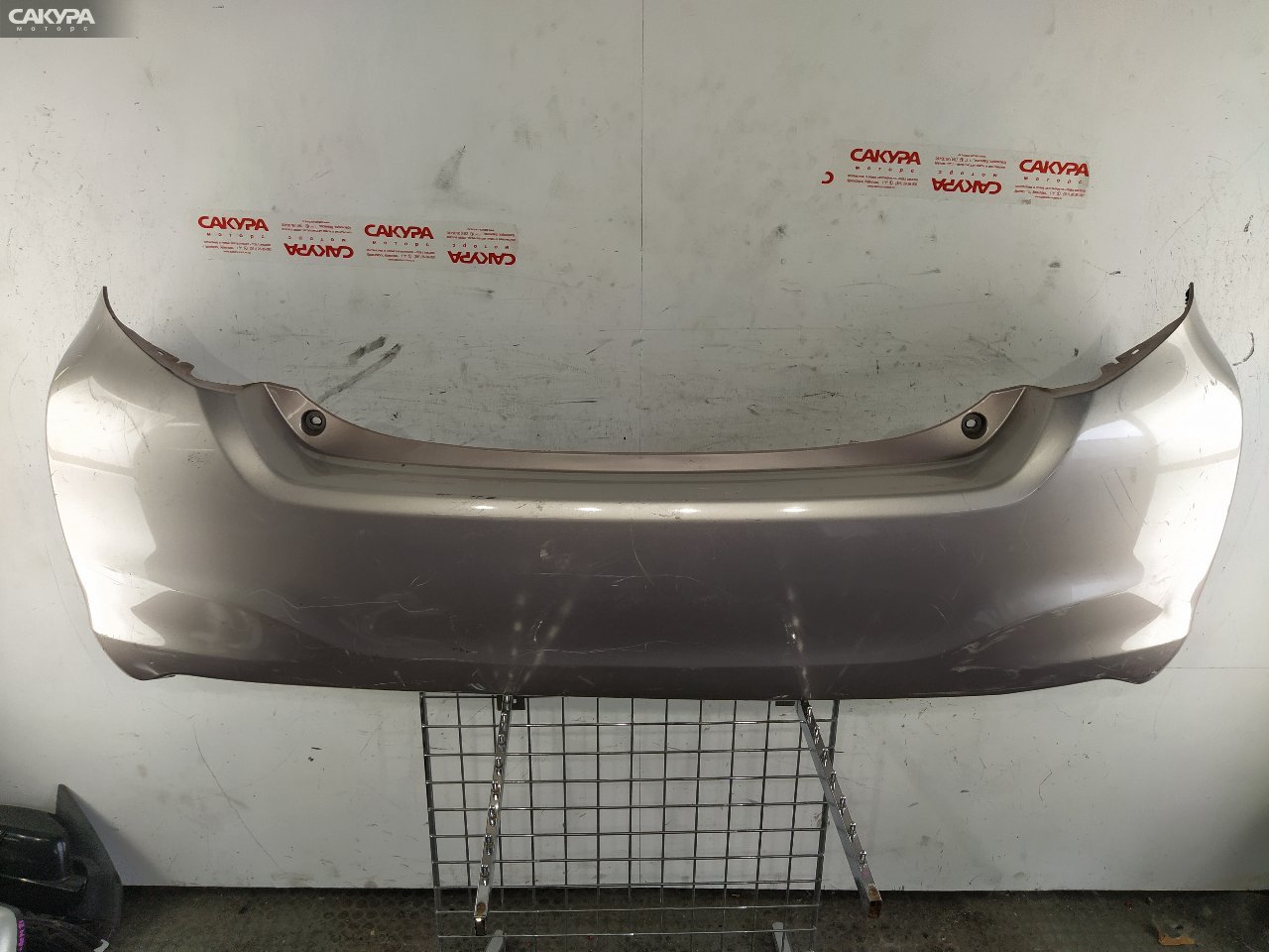 Бампер задний Toyota Vitz NSP130 1NR-FE: купить в Сакура Красноярск.
