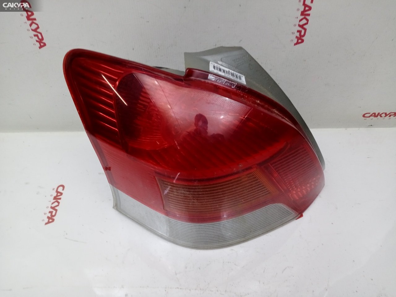 Фонарь стоп-сигнала левый Toyota Vitz KSP90 1KR-FE 52-187: купить в Сакура Красноярск.