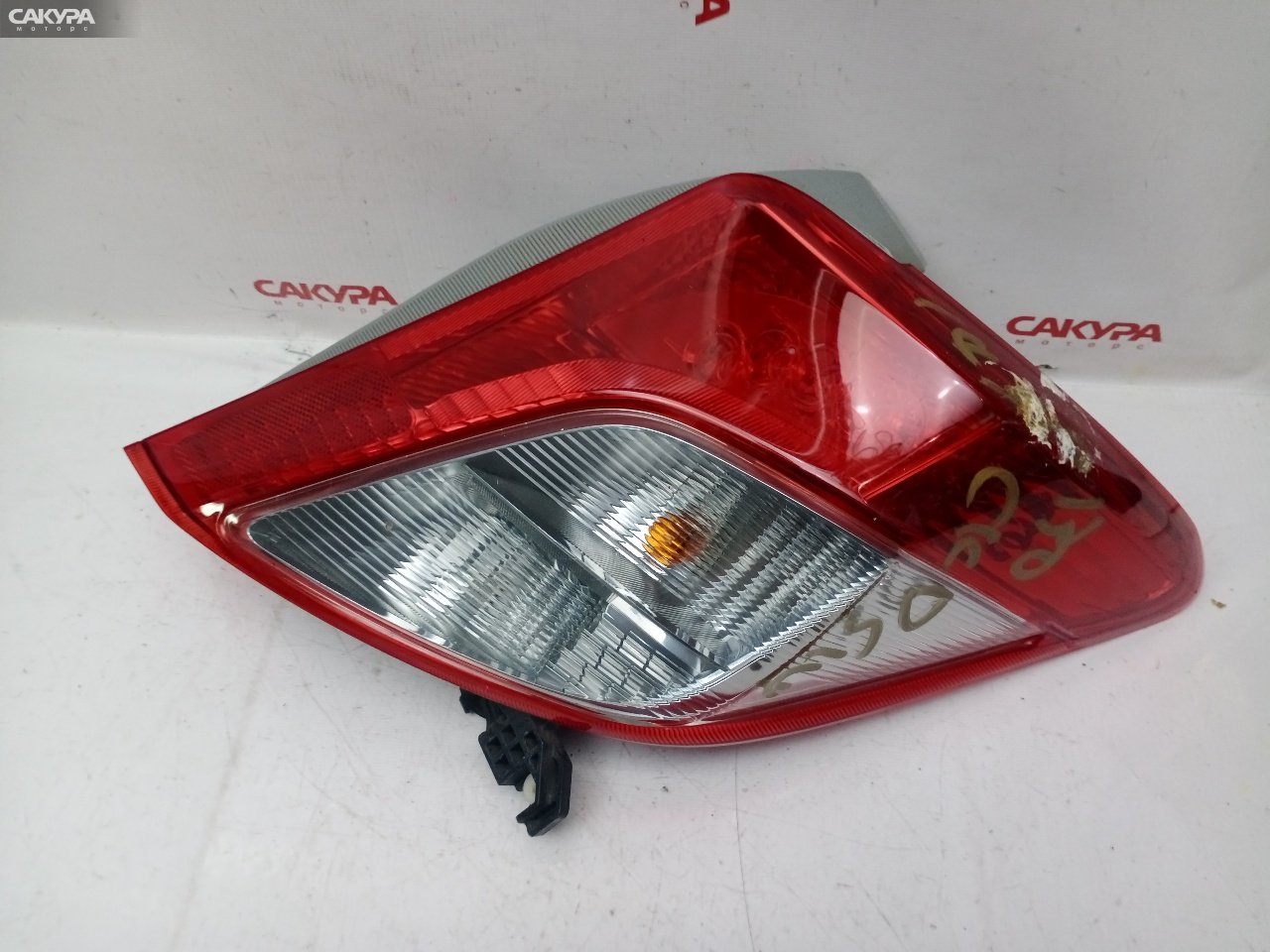 Фонарь стоп-сигнала правый Toyota Vitz NSP130 1NR-FE 52-228: купить в Сакура Красноярск.