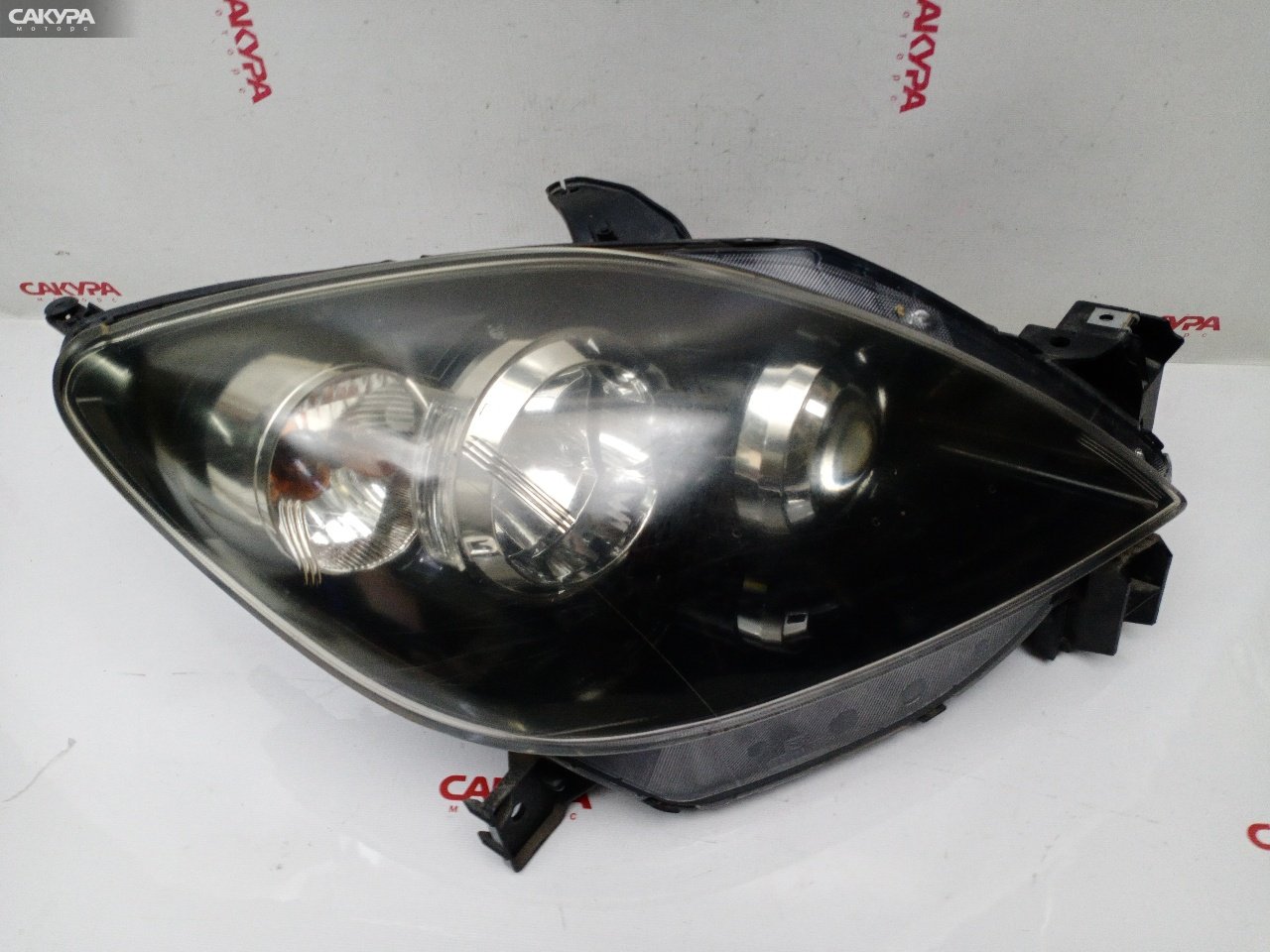 Фара правая Mazda Demio DY5W ZY-VE P5062: купить в Сакура Красноярск.