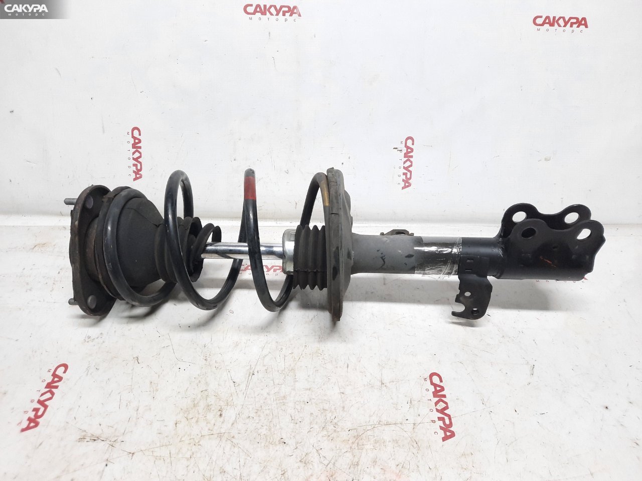 Стойка подвески передняя левая Toyota Corolla Axio NZE141 1NZ-FE: купить в Сакура Красноярск.