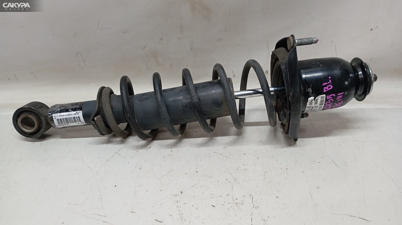 Стойка подвески задняя левая Toyota Corolla Axio NZE141 1NZ-FE: купить в Сакура Красноярск.
