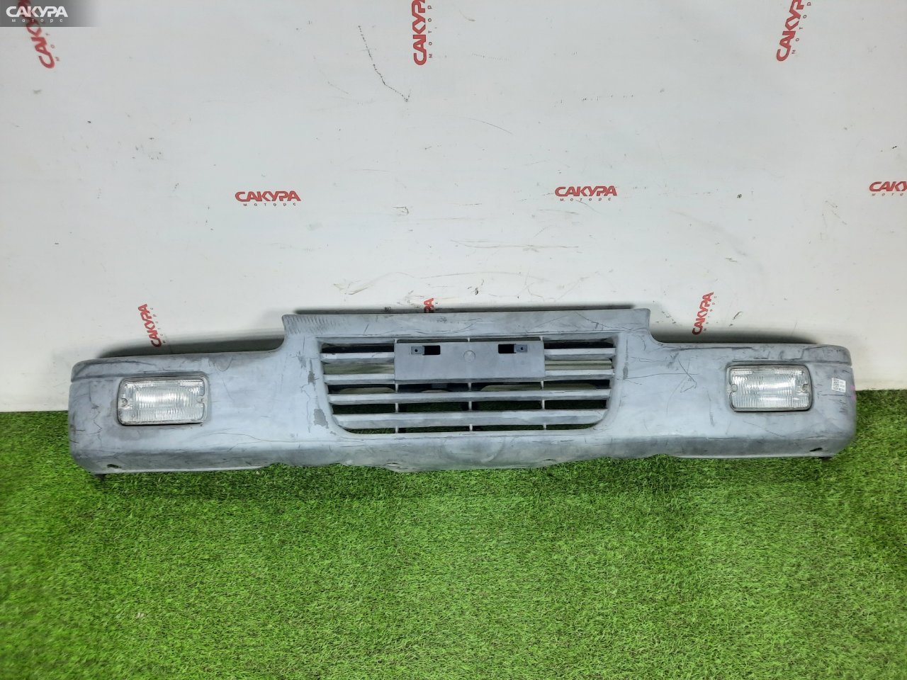Бампер передний Nissan Atlas SH4F23 KA20DE: купить в Сакура Красноярск.