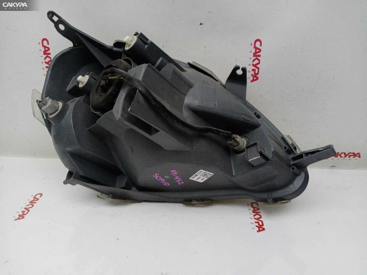 Фара левая Toyota Vitz SCP10 1SZ-FE 52-046: купить в Сакура Красноярск.