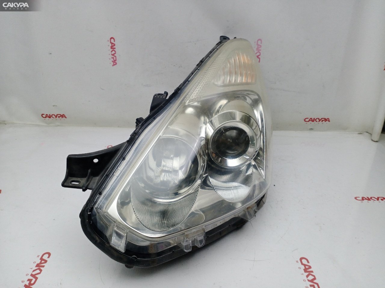 Фара левая Toyota Wish ZNE10G 1ZZ-FE 68-12: купить в Сакура Красноярск.