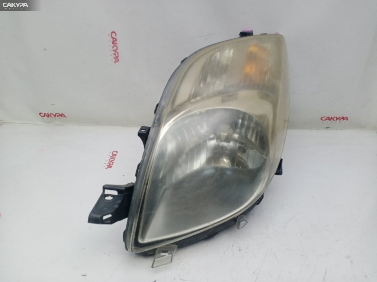 Фара левая Toyota Vitz KSP90 1KR-FE 52-170: купить в Сакура Красноярск.