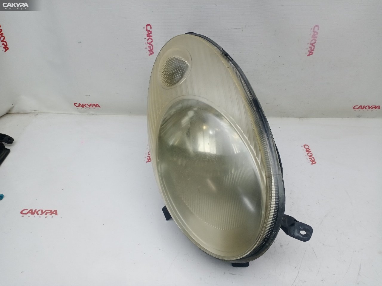 Фара правая Nissan March AK12 CR12DE 1704: купить в Сакура Красноярск.