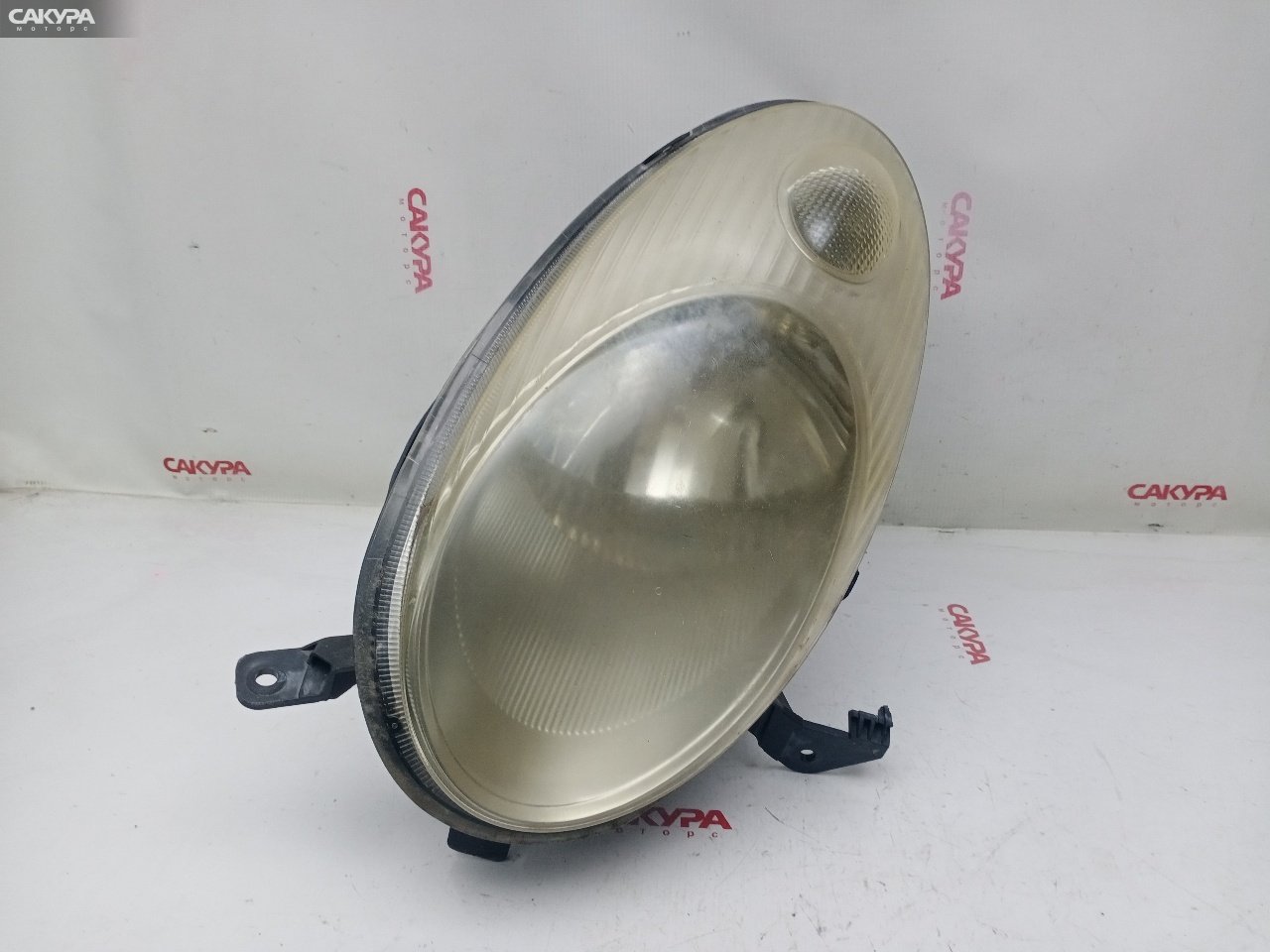 Фара левая Nissan March AK12 CR12DE 1704: купить в Сакура Красноярск.