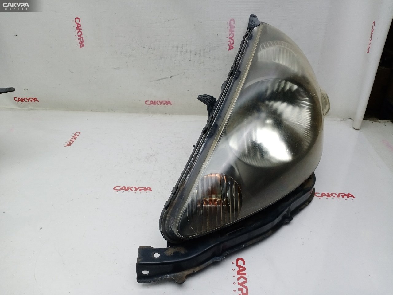 Фара левая Honda FIT GD1 L13A P1680: купить в Сакура Красноярск.