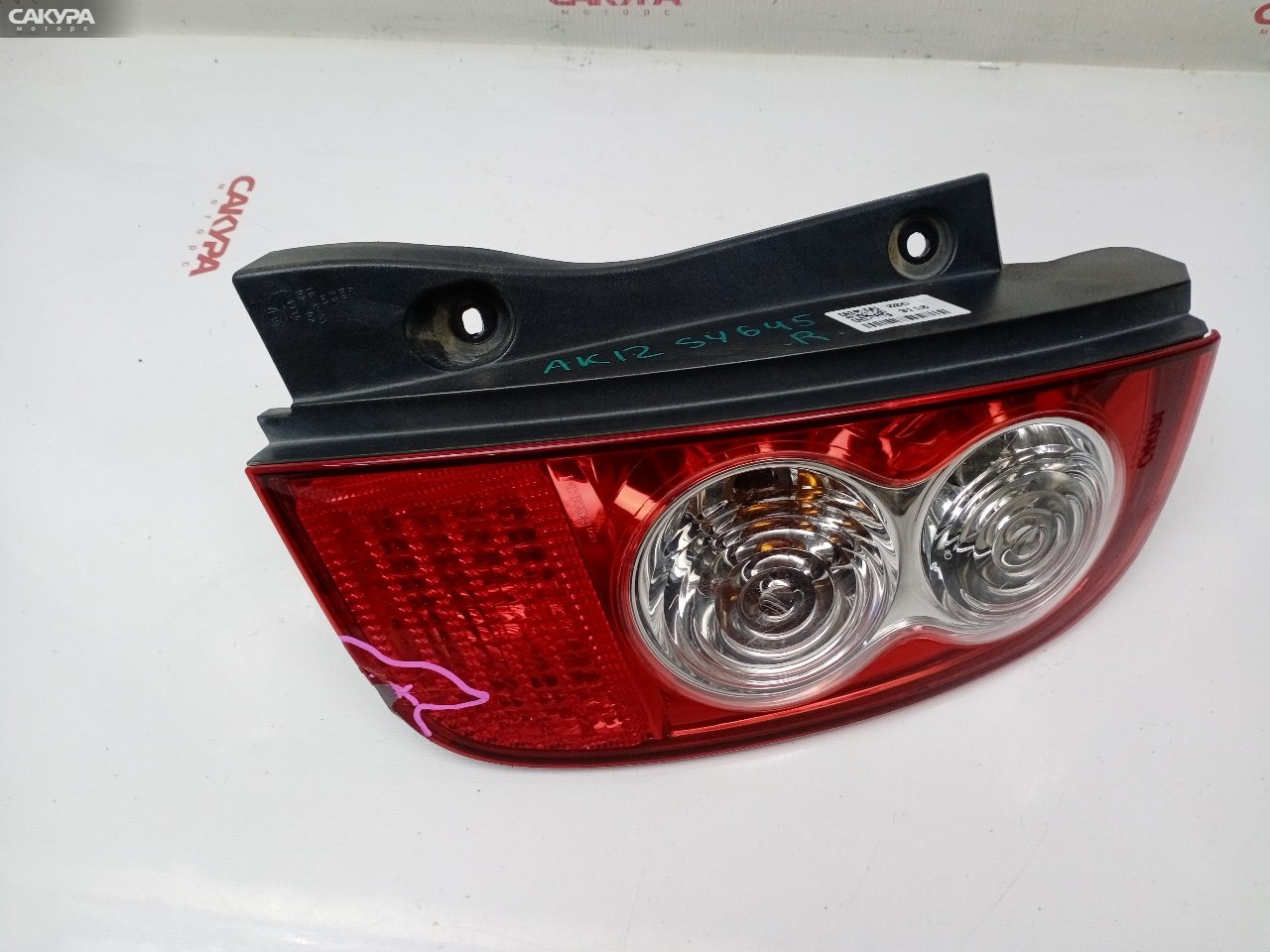 Фонарь стоп-сигнала правый Nissan March AK12 CR12DE D019: купить в Сакура Красноярск.