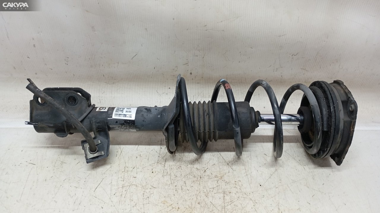 Стойка подвески передняя правая Nissan March AK12 CR12DE: купить в Сакура Красноярск.