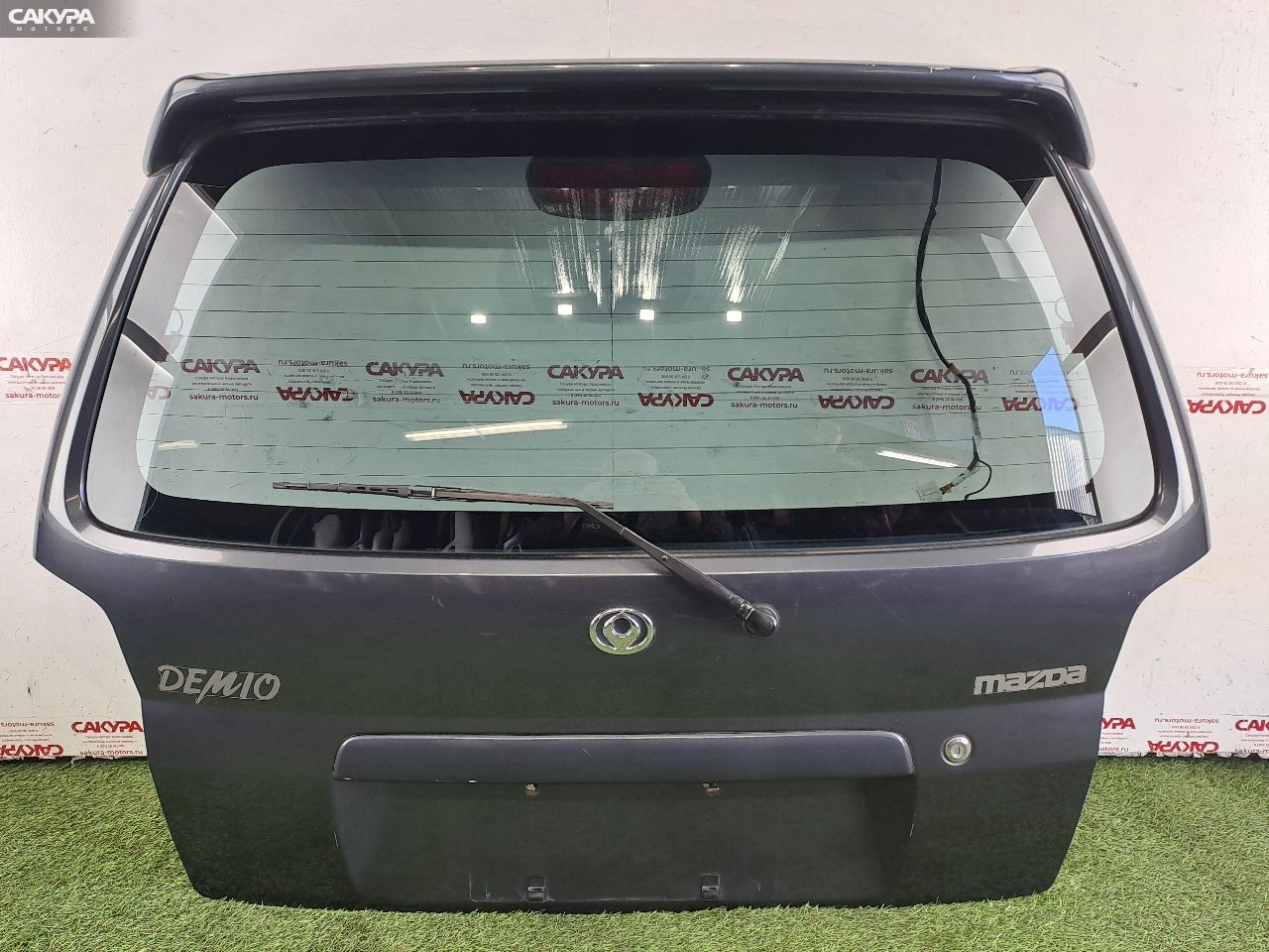 Дверь багажника Mazda Demio DW5W B5-ME: купить в Сакура Красноярск.