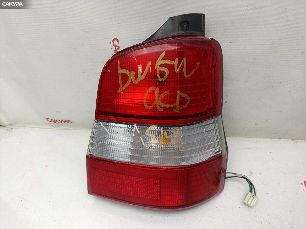 Фонарь стоп-сигнала правый Mazda Demio DW5W B5-ME 4781: купить в Сакура Красноярск.