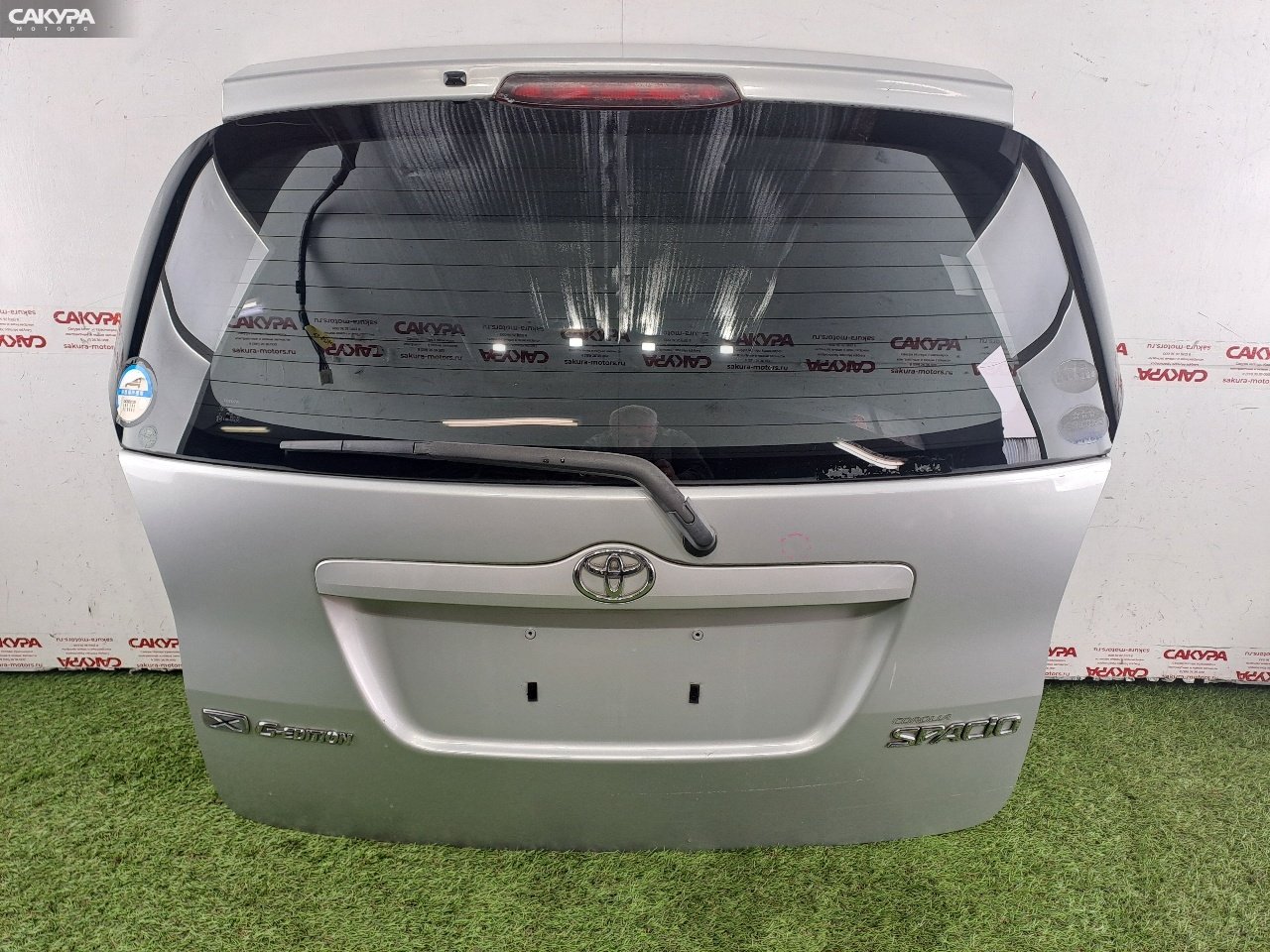 Дверь багажника Toyota Corolla Spacio NZE121N 1NZ-FE: купить в Сакура Красноярск.