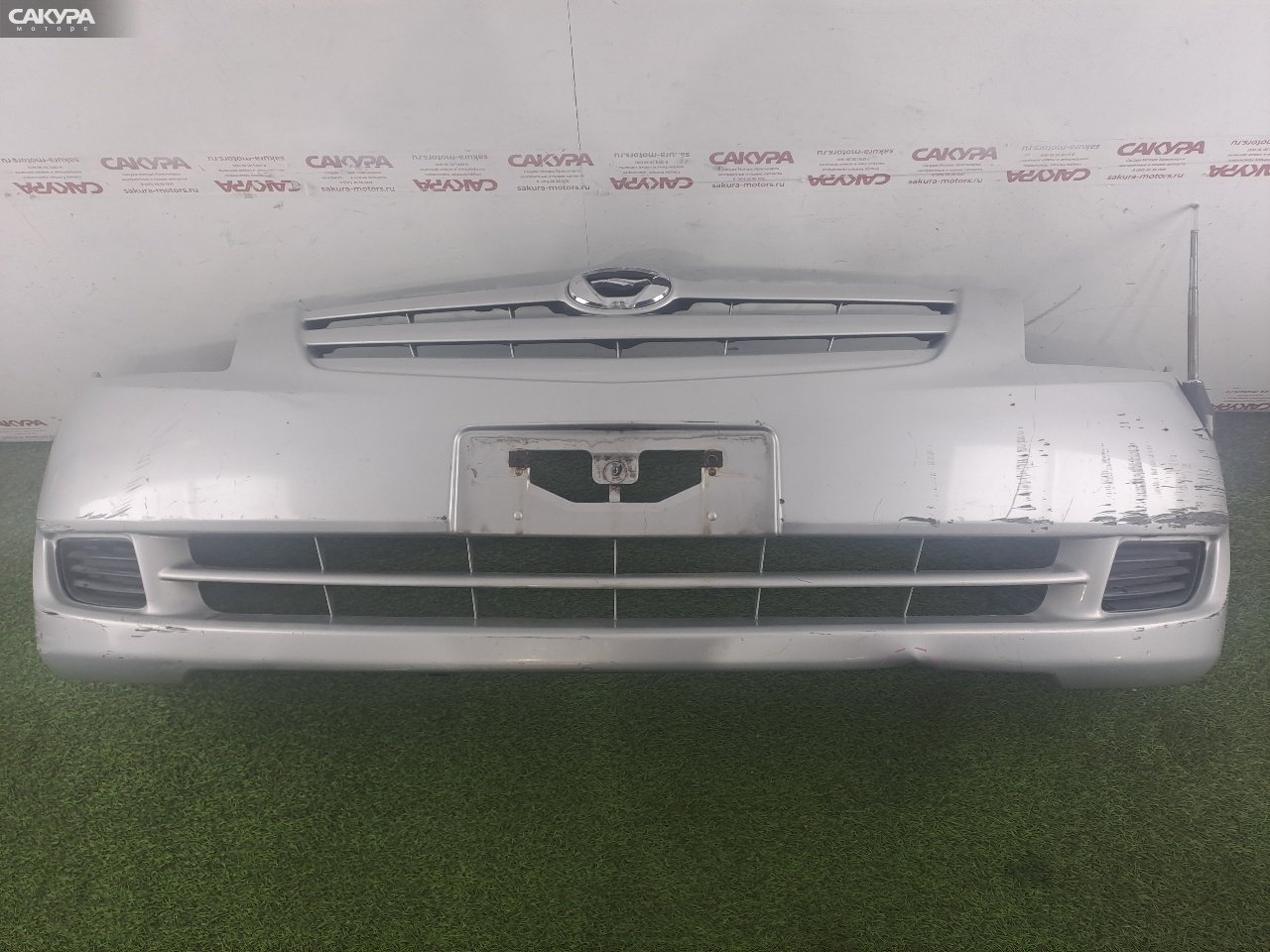 Бампер передний Toyota Corolla Spacio NZE121N 1NZ-FE A2A4U3: купить в Сакура Красноярск.