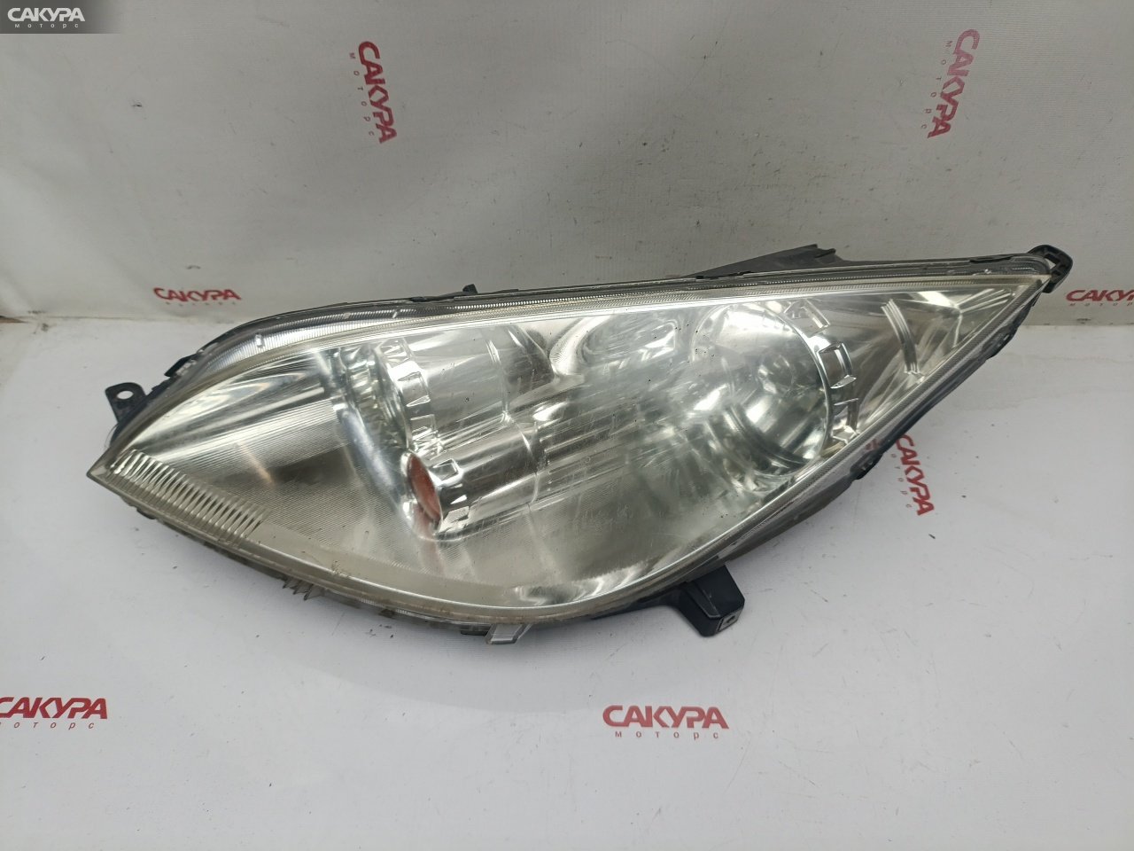 Фара левая Mitsubishi Colt Z25A 4G19 P2970: купить в Сакура Красноярск.