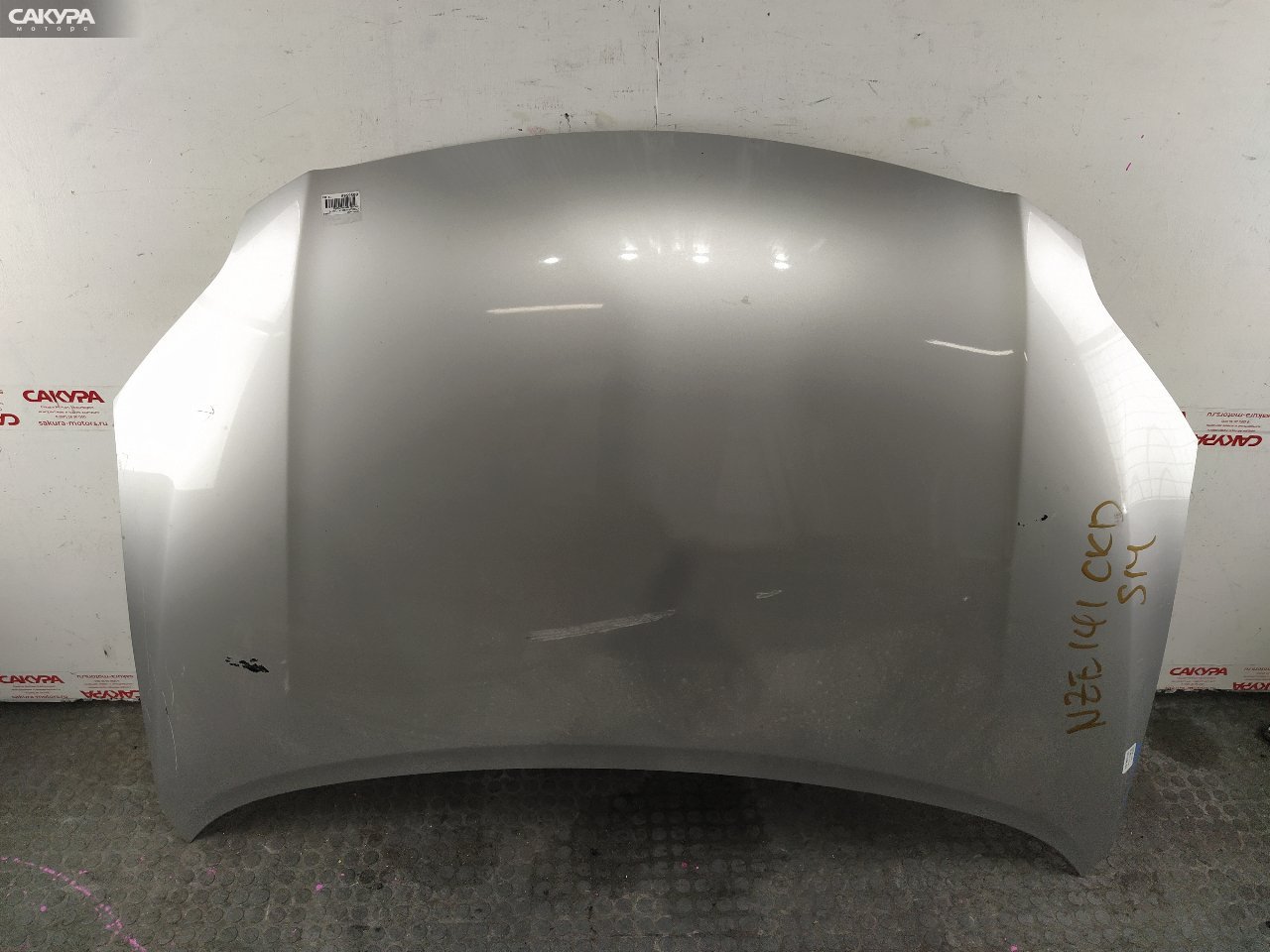 Капот Toyota Corolla Axio NZE141 1NZ-FE: купить в Сакура Красноярск.