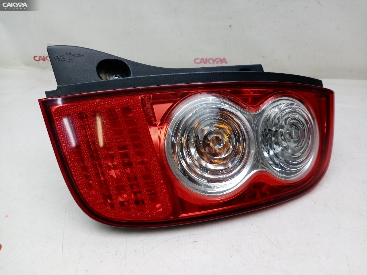 Фонарь стоп-сигнала правый Nissan March AK12 CR12DE D019: купить в Сакура Красноярск.