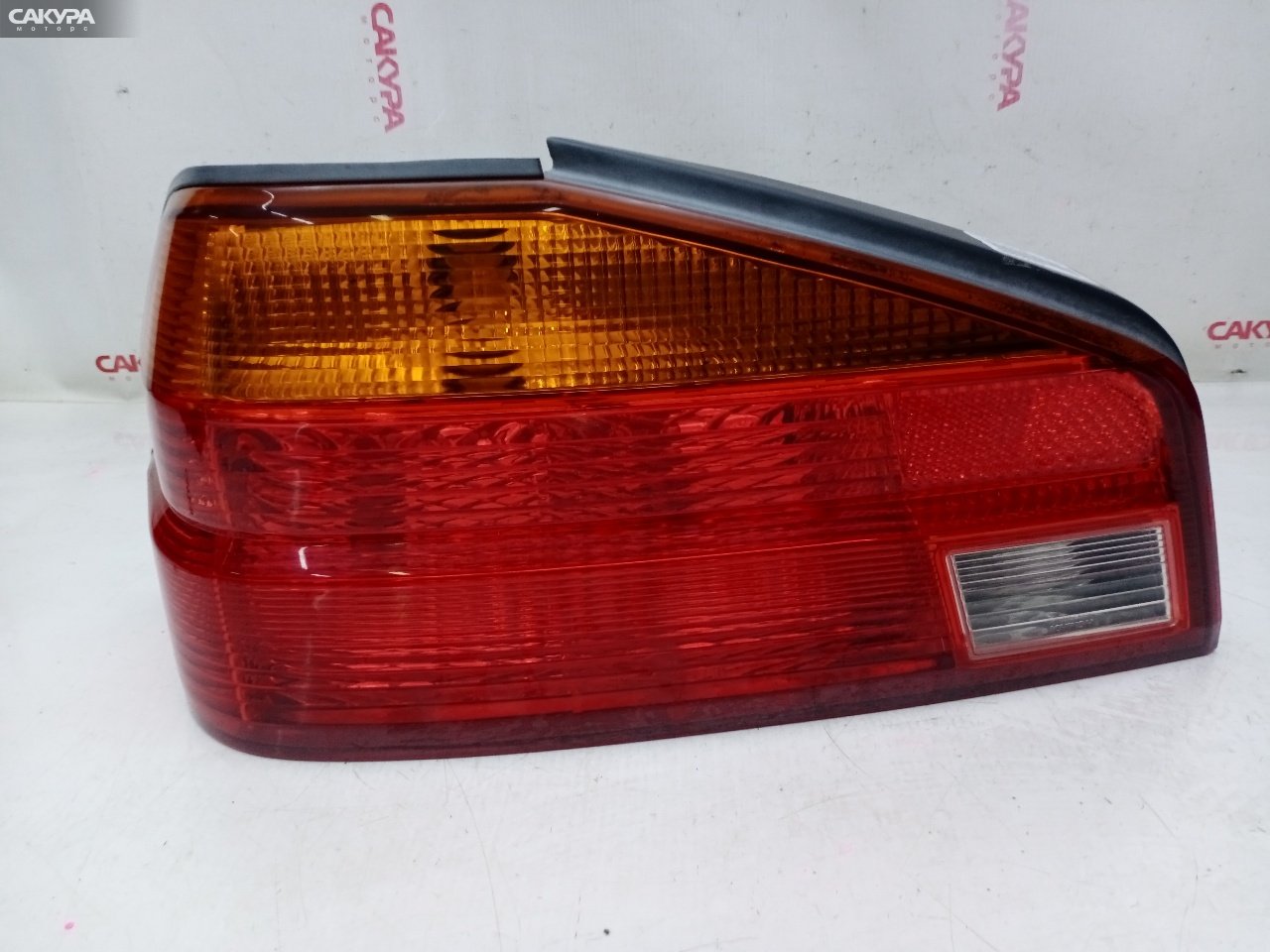 Фонарь стоп-сигнала левый Nissan Laurel HC35 RB20DE 4789: купить в Сакура Красноярск.